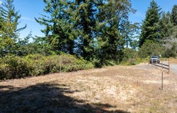 65294 E BAY Rd, NorthBend, OR 97459