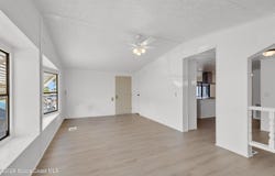 908 OLEANDER CIRCLE, BAREFOOT BAY, FL 32976
