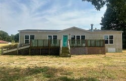 202 E I Avenue, Milburn, OK 73450