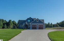1776 E BELLINGER ROAD, CEDAR, MI 49621