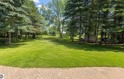 1401 Ryans Pond, Grawn, MI 49637