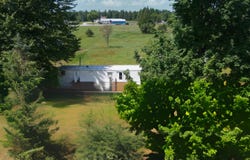 1395 E Duck Lake Road, Grawn, MI 49637