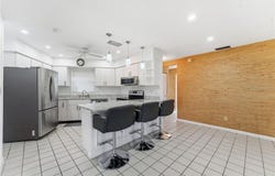 4 E GREENS CIRCLE, LEHIGH ACRES, FL 33936