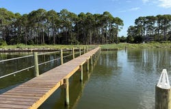 9 Hammock Cove Rd, Eastpoint, FL 32328