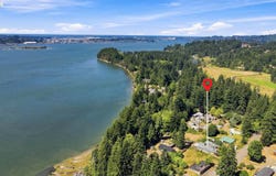 64608 E BAY Rd, NorthBend, OR 97459