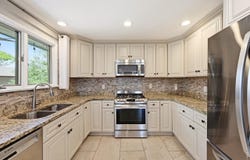 8241 W Pomona Dr, Arvada, CO 80005