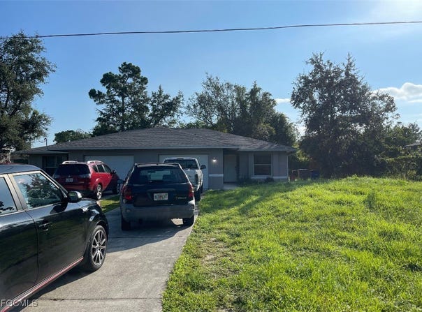 123 Meadow Road, Lehigh Acres, FL 33973