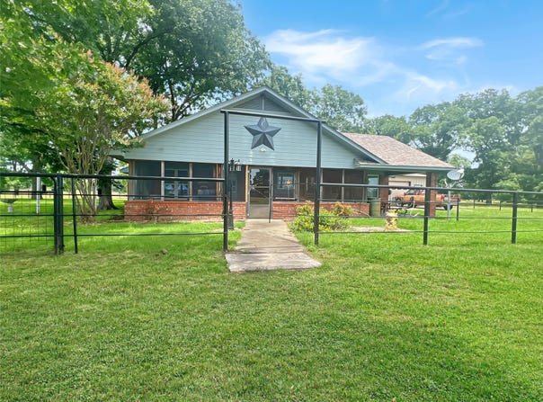695 County Road 1210, Lake Creek, TX 75450