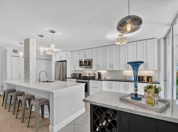 103 Half Moon Circle, Hypoluxo, FL 33462