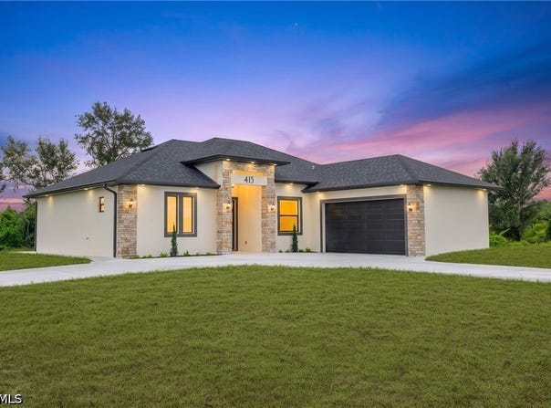 415 Chamonix Avenue S, Lehigh Acres, FL 33974