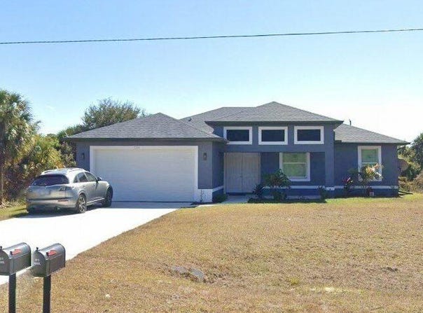 1244 Jaguar Boulevard, Lehigh Acres, FL 33974