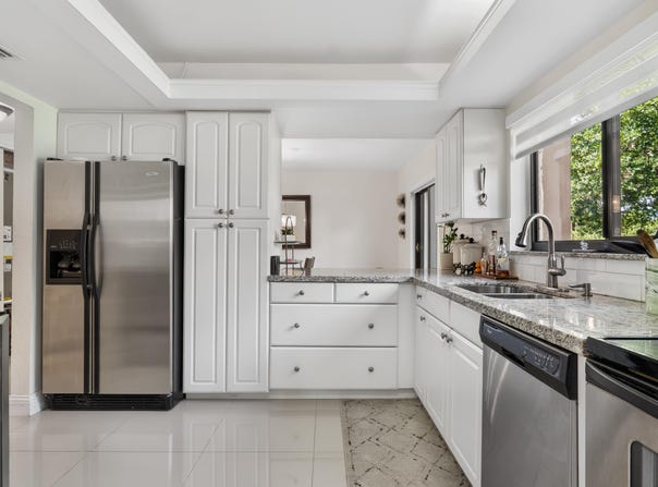 219 Wimbledon Lakes Drive, Plantation, FL 33324