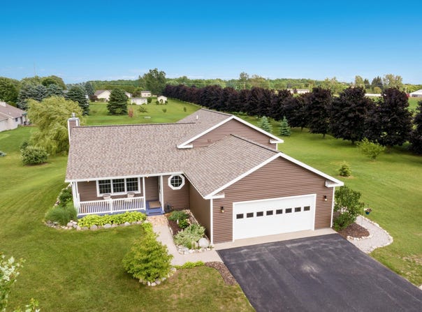 7874 E LONGBRANCH CIRCLE, TRAVERSE CITY, MI 49684