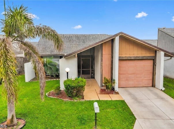18450 Orangecrest Court, Lehigh Acres, FL 33936