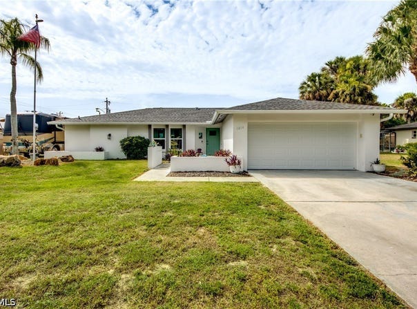1214 Baldwin Place, Lehigh Acres, FL 33936