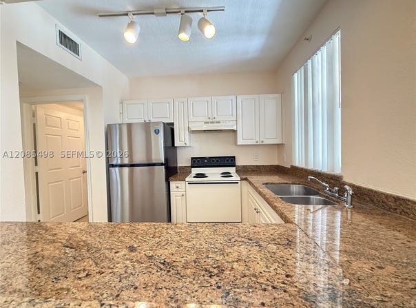 6796 W Sample Rd, Coral Springs, FL 33067