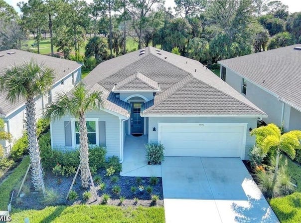 9146 Leatherwood Loop, Lehigh Acres, FL 33936