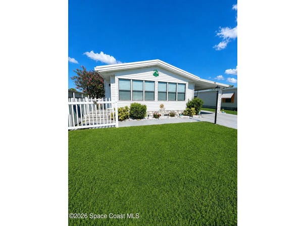 920 Hyacinth Circle, Barefoot Bay, FL 32976
