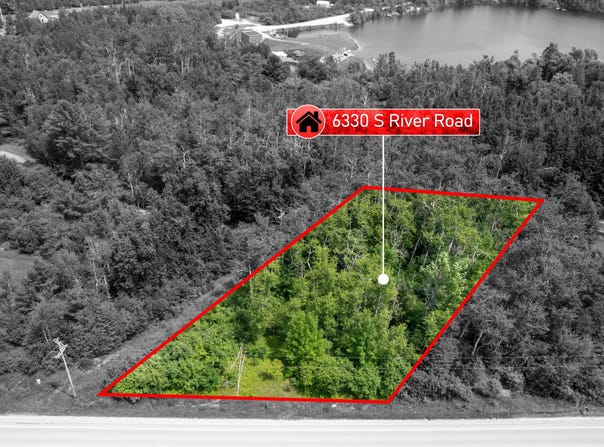 6330 S RIVER ROAD, CHEBOYGAN, MI 49721