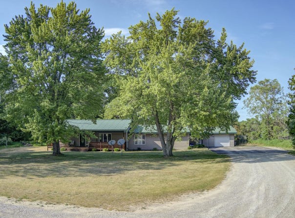 4793 E Duck Lake Road, Grawn, MI 49637