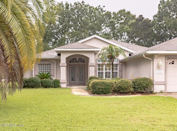 99 ERIC Drive, Palm Coast, FL 32164