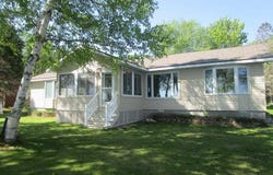 9218 PACHY, CARP LAKE, MI 49718