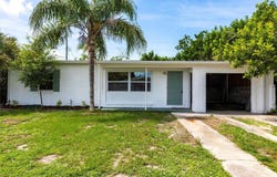 110 POINSETTIA CIRCLE NE, PORT CHARLOTTE, FL 33952