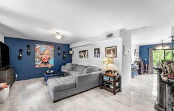 209 Wimbledon Lakes Drive, Plantation, FL 33324