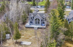7734 N Shore Court, Grawn, MI 49637