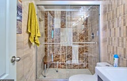 8009 GREENSPRING WAY, OWINGS MILLS, MD 21117