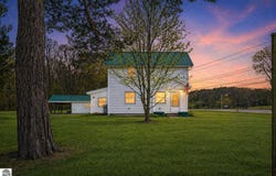 111 W FOREST HOME AVENUE, BELLAIRE, MI 49615