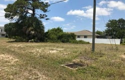 215 SW 9TH PLACE, CAPE CORAL, FL 33991