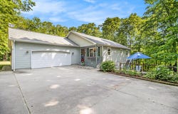 9510 Pere Marquette Drive, Canadian Lakes, MI 49346