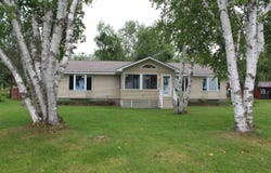 9218 PACHY, CARP LAKE, MI 49718
