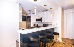 18-05  215th Street, Bayside, NY 11360