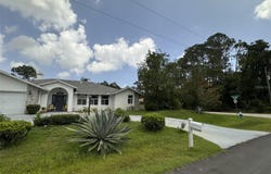 52 WOOD CENTER LANE, PALM COAST, FL 32164