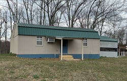 130 CLEMENT ST, BIG SANDY, TN 38221
