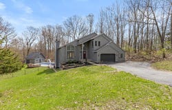 7721 Sun Quest Ridge Drive NE, Ada, MI 49301