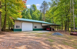 11079 WOODLAND DR, Woodruff, WI 54568