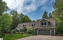 348 E SUGAR BAY LANE, CEDAR, MI 49621