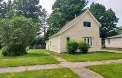 443 W SLOSSON AVENUE, REED CITY, MI 49677