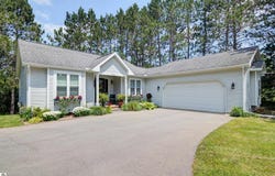 7070 APPOLLO LAKE LANE, TRAVERSE CITY, MI 49685-7052