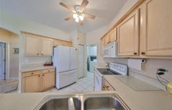 2112 ACADIA GREENS DRIVE, SUN CITY CENTER, FL 33573
