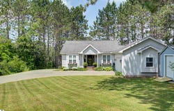 7070 APPOLLO LAKE LANE, TRAVERSE CITY, MI 49685-7052