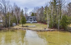7734 N Shore Court, Grawn, MI 49637