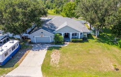 10932 WILLIAMS AVENUE, HOWEY IN THE HILLS, FL 34737