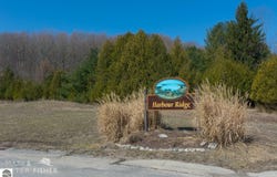 16 W HARBOUR RIDGE, MAPLE CITY, MI 49664