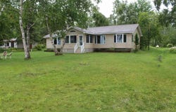9218 PACHY, CARP LAKE, MI 49718