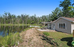 1935 FIVE LAKES ROAD, GAYLORD, MI 49735