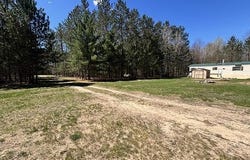 3727 Boardwalk Way NE, Rapid River Twp, MI 49659